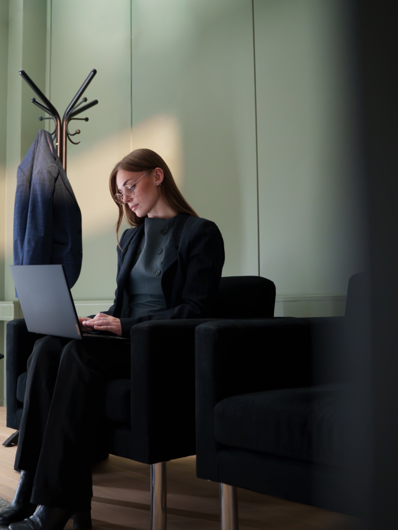 Advisor walking through a corporate atrium